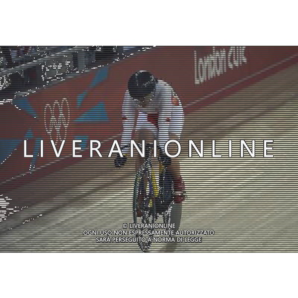 (120803) -- LONDON, Aug. 3, 2012 () -- Guo Shuang of China cycles after finishing the women\'s Keirin competition of Cycling track event at London 2012 Olympic Games, London, Britain, Aug. 3, 2012. Guo Shuang won the silver medal of the event. (/Wang Jianhua) ©PHOTOSHOT/Agenzia Aldo Liverani Sas - ITALY ONLY - GIOCHI OLIMPICI, OLIMPIADI LONDRA 2012
