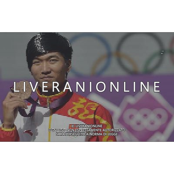(120803) -- LONDON, Aug. 3, 2012 () -- China\'s Dai Xiaoxiang poses with bronze medal at awarding ceremony of men\'s individual of archery, at London 2012 Olympic Games in London, Britain, August 3, 2012. Dai Xiaoxiang won the bronze medal. (/Gesang Dawa) (zgp) ©PHOTOSHOT/Agenzia Aldo Liverani Sas - ITALY ONLY - GIOCHI OLIMPICI, OLIMPIADI LONDRA 2012
