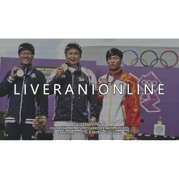 (120803) -- LONDON, Aug. 3, 2012 () -- Gold medalist Oh Jin Hyek (C) of South Korea, silver medalist Takaharu Furukawa (L) of Japan and bronze medalist Dai Xiaoxiang of China pose at awarding ceremony of men\'s individual of archery, at London 2012 Olympic Games in London, Britain, August 3, 2012. (/Gesang Dawa) (zgp) ©PHOTOSHOT/Agenzia Aldo Liverani Sas - ITALY ONLY - GIOCHI OLIMPICI, OLIMPIADI LONDRA 2012