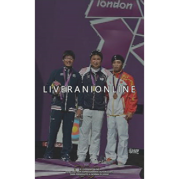 (120803) -- LONDON, Aug. 3, 2012 () -- Gold medalist Oh Jin Hyek (C) of South Korea, silver medalist Takaharu Furukawa (L) of Japan and bronze medalist Dai Xiaoxiang of China pose at awarding ceremony of men\'s individual of archery, at London 2012 Olympic Games in London, Britain, August 3, 2012. (/Gesang Dawa) (zgp) ©PHOTOSHOT/Agenzia Aldo Liverani Sas - ITALY ONLY - GIOCHI OLIMPICI, OLIMPIADI LONDRA 2012