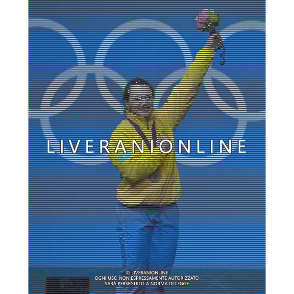 (120803) -- LONDON, Aug. 3, 2012 () -- Svetlana Podobedova of Kazakhstan celebrates at the awarding ceremony of women\'s 75kg weightlifting event at London 2012 Olympic Games, London, Britain, Aug. 3, 2012. Svetlana Podobedova claimed the gold medal of the event and set a new Olympic Record of clean and jerk of this event with a weight of 161kg. (/Gong Lei) ©PHOTOSHOT/Agenzia Aldo Liverani Sas - ITALY ONLY - GIOCHI OLIMPICI, OLIMPIADI LONDRA 2012