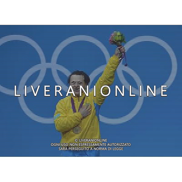 (120803) -- LONDON, Aug. 3, 2012 () -- Svetlana Podobedova of Kazakhstan celebrates at the awarding ceremony of women\'s 75kg weightlifting event at London 2012 Olympic Games, London, Britain, Aug. 3, 2012. Svetlana Podobedova claimed the gold medal of the event and set a new Olympic Record of clean and jerk of this event with a weight of 161kg. (/Gong Lei) ©PHOTOSHOT/Agenzia Aldo Liverani Sas - ITALY ONLY - GIOCHI OLIMPICI, OLIMPIADI LONDRA 2012
