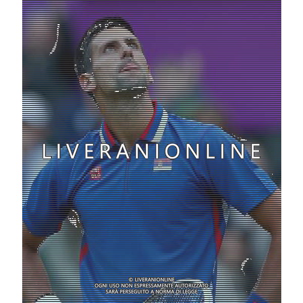(120803) -- LONDON, Aug. 3, 2012 () -- Novak Djokovic of Serbia reacts during men\'s tennis singles semifinals contest, at London 2012 Olympic Games in London, Britain, on August 3, 2012. Andy Murray of Britain defeated Novak Djokovic of Serbia 2-0. (/Chen Jianli) (zgp) ©PHOTOSHOT/Agenzia Aldo Liverani Sas - ITALY ONLY - GIOCHI OLIMPICI, OLIMPIADI LONDRA 2012