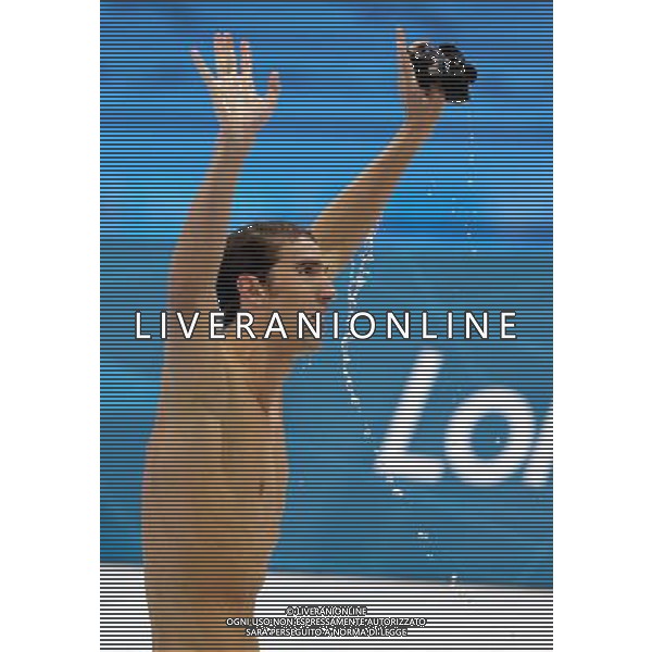 (120803) -- LONDON, Aug. 3, 2012 () -- Michael Phelps of U.S. celebrates after men¡¯s 100m butterfly final of swimming competition, at London 2012 Olympic Games in London, Britain, August 3, 2012. Michael Phelps won gold medal with 51.21.(/Fan Jun) (zgp) ©PHOTOSHOT/Agenzia Aldo Liverani Sas - ITALY ONLY - GIOCHI OLIMPICI, OLIMPIADI LONDRA 2012