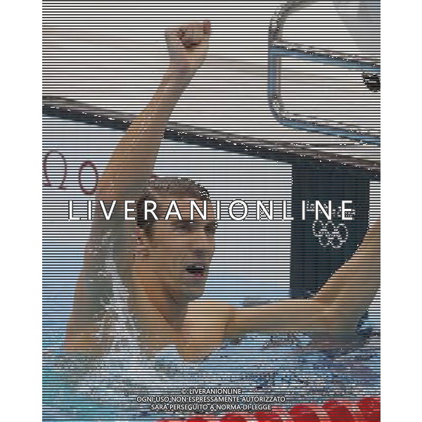 (120803) -- LONDON, Aug. 3, 2012 () -- Michael Phelps of U.S. reacts after men¡¯s 100m butterfly final of swimming competition, at London 2012 Olympic Games in London, Britain, August 3, 2012. Michael Phelps won gold medal with 51.21.(/Fan Jun) (zgp) ©PHOTOSHOT/Agenzia Aldo Liverani Sas - ITALY ONLY - GIOCHI OLIMPICI, OLIMPIADI LONDRA 2012