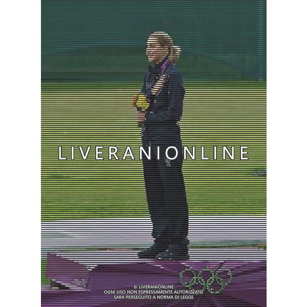 Olympic Games , Royal Artillery Barracks,Olympic Games. Jessica Rossi Agente della Polizia di Stato Centra un Oro da Record 99 su 100, il Trap Mondiale e\' ai Suoi Piedi. Dedicato a Tutti Quelli delle Forze dell\'Ordine che Fanno Bene il Proprio Dovere. Foto di Ferdinando Mezzelani-GMT AG ALDO LIVERANI S A S