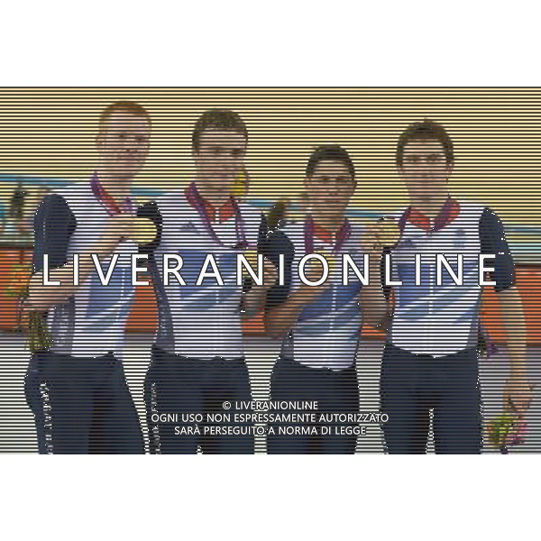 L-R Great Britain\'s Gold medalist\'s Ed Clancy, Steven Burke, Peter Kennaugh and Geraint Thomas MBE show off there medals after winning the Men\'s Teams Persuit 2012 London Olympics - Cycling Track - Day 7 - Friday 3rd August 2012 - Velodrome - Olympic Park - London å© CameraSport - 43 Linden Ave. Countesthorpe. Leicester. England. LE8 5PG - Tel: +44 (0) 116 277 4147 - admin@camerasport.com - www.camerasport.com AG ALDO LIVERANI S A S ONLY ITALY