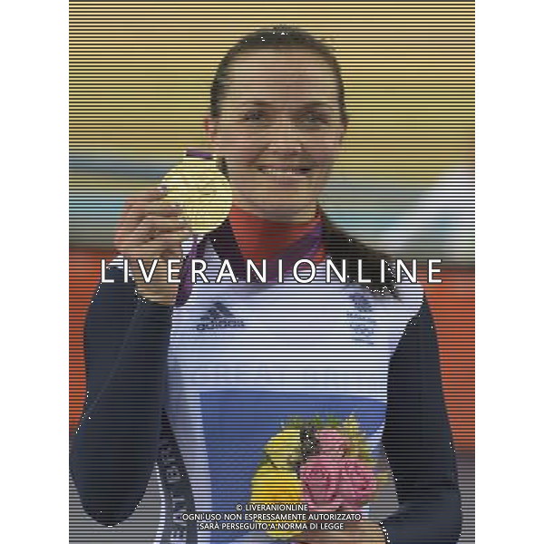 Great Britain\'s Victoria Pendleton celebrates winning the first ever gold in the Woman\'s Keirin race 2012 London Olympics - Cycling Track - Day 7 - Friday 3rd August 2012 - Velodrome - Olympic Park - London å© CameraSport - 43 Linden Ave. Countesthorpe. Leicester. England. LE8 5PG - Tel: +44 (0) 116 277 4147 - admin@camerasport.com - www.camerasport.com AG ALDO LIVERANI S A S ONLY ITALY