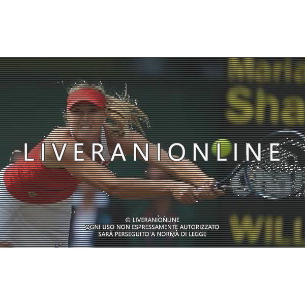 (120804) -- LONDON, Aug. 4, 2012 () -- Maria Sharapova of Russia takes part in women\'s tennis singles gold medal match, at London 2012 Olympic Games in London, Britain, on August 4, 2012. Serena Williams of USA defeated Maria Sharapova of Russia 2-0. (/Tao Xiyi) (nxl) ©PHOTOSHOT/Agenzia Aldo Liverani Sas - ITALY ONLY - GIOCHI OLIMPICI, OLIMPIADI LONDRA 2012