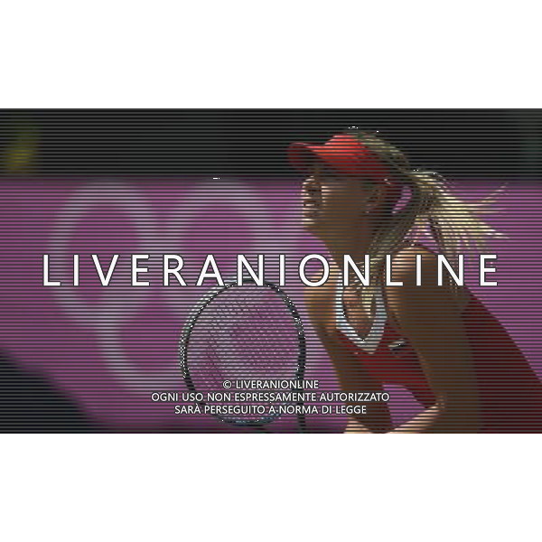 (120804) -- LONDON, Aug. 4, 2012 () -- Maria Sharapova of Russia takes part in women\'s tennis singles gold medal match, at London 2012 Olympic Games in London, Britain, on August 4, 2012. Serena Williams of USA defeated Maria Sharapova of Russia 2-0. (/Tao Xiyi) (nxl) ©PHOTOSHOT/Agenzia Aldo Liverani Sas - ITALY ONLY - GIOCHI OLIMPICI, OLIMPIADI LONDRA 2012