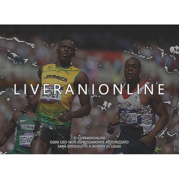 (120804) -- LONDON, Aug. 4, 2012 () -- Usain Bolt (L) of Jamaica acts during the men\'s 100m round 1 heats at London 2012 Olympic Games, London, Britain, Aug. 4, 2012. Usain Bolt was qualified for the semifinal with a time of 10.09 seconds. (/Liao Yujie) ©PHOTOSHOT/Agenzia Aldo Liverani Sas - ITALY ONLY - GIOCHI OLIMPICI, OLIMPIADI LONDRA 2012