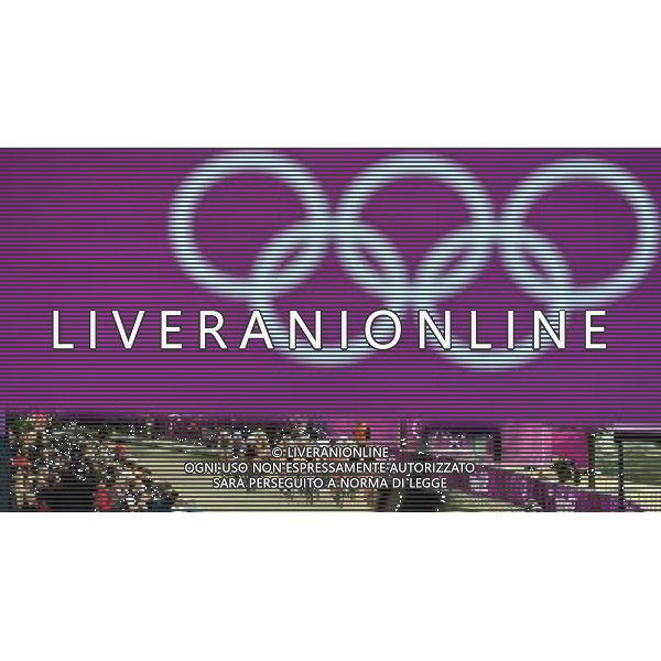 (120804) -- LONDON, Aug. 4, 2012 () -- Athletes compete during women\'s triathlon competition at London 2012 Olympic Games in London, Britain, August 4, 2012. Nicola Spirig of Switzerland won gold medal with 1:59.48. (/Gesang Dawa) (zgp) ©PHOTOSHOT/Agenzia Aldo Liverani Sas - ITALY ONLY - GIOCHI OLIMPICI, OLIMPIADI LONDRA 2012