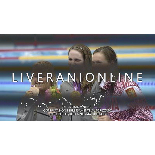 Elizabeth Beisel USA Bronze medalist, Missy Franklin USA winner of the Womens 200m backstroke with Anastasia Zueva Russia Silver medalist. Aquatics Centre, Olympic Park. London ©PHOTOSHOT/Agenzia Aldo Liverani Sas - ITALY ONLY - GIOCHI OLIMPICI, OLIMPIADI LONDRA 2012
