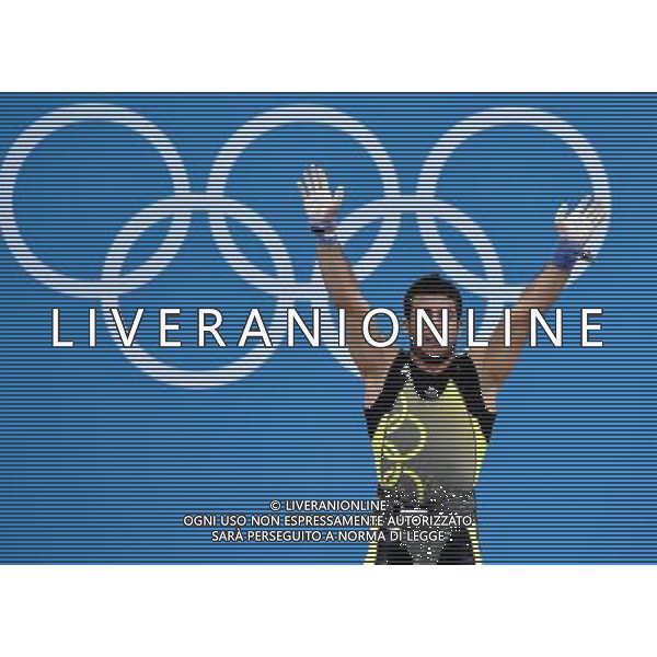 (120803) -- LONDON, Aug. 3, 2012 () -- Kianoush Rostami of Iran celebrates during men\'s 85kg weightlifting event at London 2012 Olympic Games, London, Britain, Aug. 3, 2012. Kianoush Rostami of Iran claimed the bronze medal of the event with a total of 380kg. (/Gong Lei) ©PHOTOSHOT/Agenzia Aldo Liverani Sas - ITALY ONLY - GIOCHI OLIMPICI, OLIMPIADI LONDRA 2012
