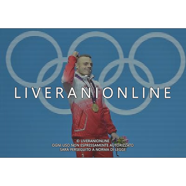 (120803) -- LONDON, Aug. 3, 2012 () -- Adrian Edward Zielinski of Poland celebrates at the awarding ceremony of men\'s 85kg weightlifting event at London 2012 Olympic Games, London, Britain, Aug. 3, 2012. Adrian Edward Zielinski claimed the gold medal of the event with a total of 385kg. (/Gong Lei) ©PHOTOSHOT/Agenzia Aldo Liverani Sas - ITALY ONLY - GIOCHI OLIMPICI, OLIMPIADI LONDRA 2012
