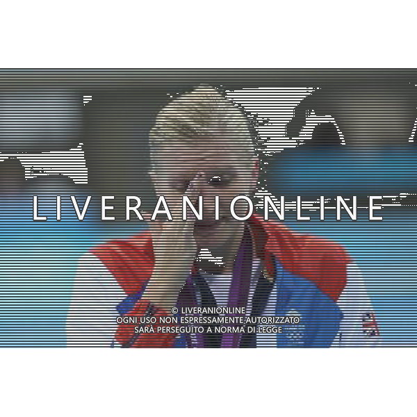 (120803) -- LONDON, Aug. 3, 2012 () -- Bronze medalist Rebecca Adlington of Britain weeps after awarding ceremony of women¡¯s 800m freestyle of swimming, at London 2012 Olympic Games in London, Britain, August 3, 2012. (/Fei Maohua) (zgp) ©PHOTOSHOT/Agenzia Aldo Liverani Sas - ITALY ONLY - GIOCHI OLIMPICI, OLIMPIADI LONDRA 2012