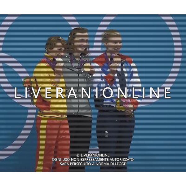 (120803) -- LONDON, Aug. 3, 2012 () -- Gold medalist Katie Ledecky (C) of U.S., silver medalist Mireia Belmonte Garcia (L) of Spain, bronze medalist Rebecca Adlington of Britain pose at awarding ceremony of women¡¯s 800m freestyle of swimming, at London 2012 Olympic Games in London, Britain, August 3, 2012. (/Fei Maohua) (zgp) ©PHOTOSHOT/Agenzia Aldo Liverani Sas - ITALY ONLY - GIOCHI OLIMPICI, OLIMPIADI LONDRA 2012