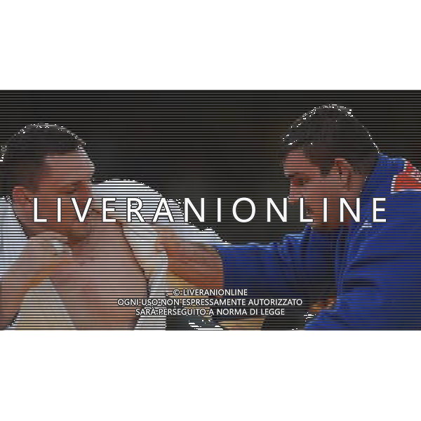 (120803) -- LONDON, Aug. 3, 2012 () -- Andreas Toelzer of Germany (in blue) competes with Ihar Makarau of Belarus during men\'s Judo +100kg bronze medal competition, at London 2012 Olympic Games in London, Britain, on August 3, 2012. Andreas Toelzer of Germany won. (/Wu Xiaoling) (nxl) ©PHOTOSHOT/Agenzia Aldo Liverani Sas - ITALY ONLY - GIOCHI OLIMPICI, OLIMPIADI LONDRA 2012