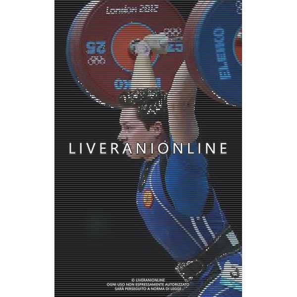 (120803) -- LONDON, Aug. 3, 2012 () -- Natalya Zabolotnaya of Russia competes during the women\'s 75kg weightlifting event at London 2012 Olympic Games, London, Britain, Aug. 3, 2012. Natalya Zabolotnaya of Russia claimed the silver medal of the event. (/Guo Yong) ©PHOTOSHOT/Agenzia Aldo Liverani Sas - ITALY ONLY - GIOCHI OLIMPICI, OLIMPIADI LONDRA 2012