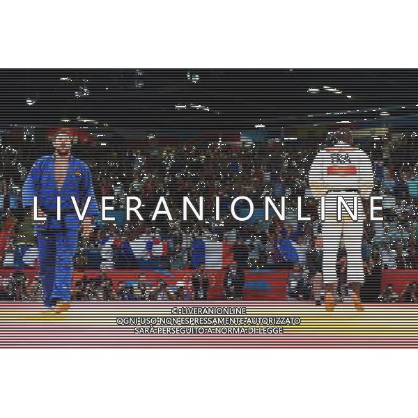 (120803) -- LONDON, Aug. 3, 2012 () -- Teddy Riner of France (in white) and Alexander Mikhaylin of Russia take part in men\'s Judo +100kg gold medal contest, at London 2012 Olympic Games in London, Britain, on August 3, 2012. Teddy Riner of France won. (/Wu Xiaoling) (nxl) ©PHOTOSHOT/Agenzia Aldo Liverani Sas - ITALY ONLY - GIOCHI OLIMPICI, OLIMPIADI LONDRA 2012