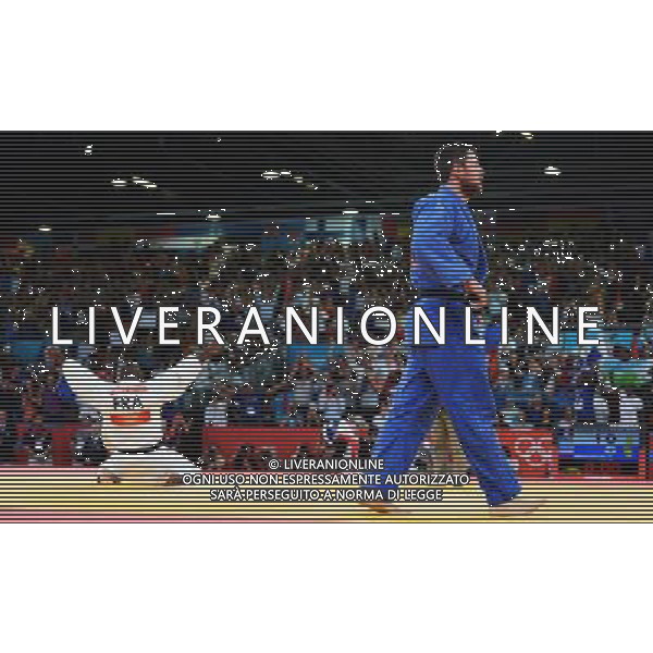 (120803) -- LONDON, Aug. 3, 2012 () -- Teddy Riner of France (in white) and Alexander Mikhaylin of Russia take part in men\'s Judo +100kg gold medal contest, at London 2012 Olympic Games in London, Britain, on August 3, 2012. Teddy Riner of France won. (/Wu Xiaoling) (nxl) ©PHOTOSHOT/Agenzia Aldo Liverani Sas - ITALY ONLY - GIOCHI OLIMPICI, OLIMPIADI LONDRA 2012
