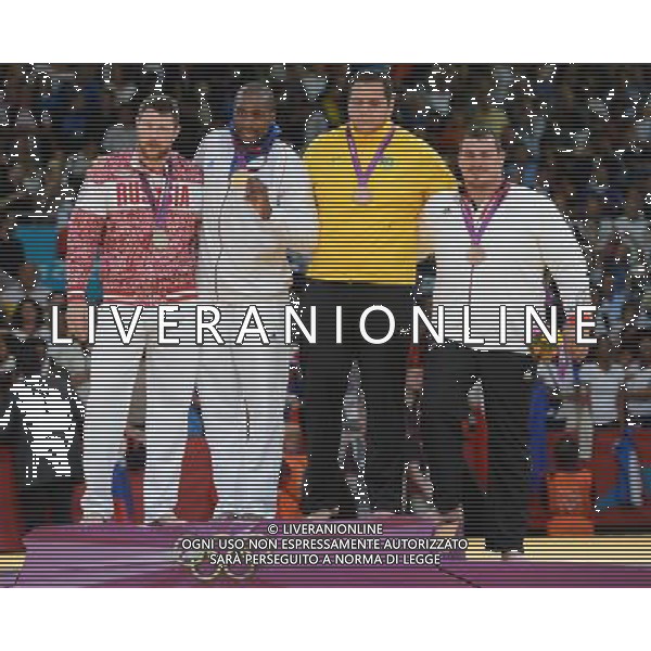 (120803) -- LONDON, Aug. 3, 2012 () -- Gold medalist Teddy Riner of France (2nd L), silver medalist Alexander Mikhaylin of Russia (1st L) and bronze medalists Rafael Silva of Brazil (3rd L) and Andreas Toelzer of Germany pose during victory ceremony of men\'s Judo +100kg competition, at London 2012 Olympic Games in London, Britain, on August 3, 2012. (/Wu Xiaoling) (nxl) ©PHOTOSHOT/Agenzia Aldo Liverani Sas - ITALY ONLY - GIOCHI OLIMPICI, OLIMPIADI LONDRA 2012