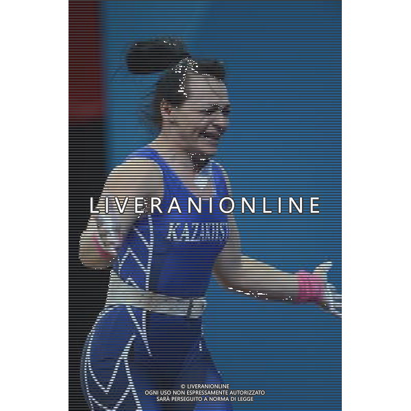 (120803) -- LONDON, Aug. 3, 2012 () -- Svetlana Podobedova of Kazakhstan celebrates after winning the women\'s 75kg weightlifting event at London 2012 Olympic Games, London, Britain, Aug. 3, 2012. Svetlana Podobedova claimed the gold medal of the event and set a new Olympic Record of clean and jerk of this event with a weight of 161kg. (/Guo Yong) ©PHOTOSHOT/Agenzia Aldo Liverani Sas - ITALY ONLY - GIOCHI OLIMPICI, OLIMPIADI LONDRA 2012