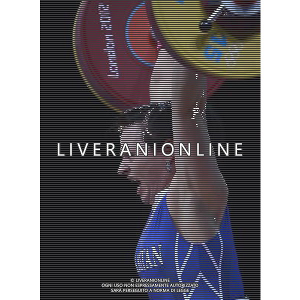 (120803) -- LONDON, Aug. 3, 2012 () -- Svetlana Podobedova of Kazakhstan competes during the women\'s 75kg weightlifting event at London 2012 Olympic Games, London, Britain, Aug. 3, 2012. Svetlana Podobedova claimed the gold medal of the event and set a new Olympic Record of clean and jerk of this event with a weight of 161kg. (/Guo Yong) ©PHOTOSHOT/Agenzia Aldo Liverani Sas - ITALY ONLY - GIOCHI OLIMPICI, OLIMPIADI LONDRA 2012