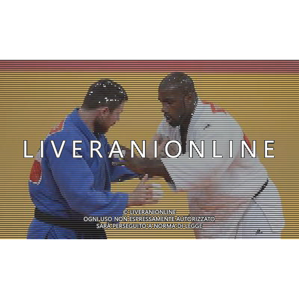 (120803) -- LONDON, Aug. 3, 2012 () -- Teddy Riner of France (in white) competes with Alexander Mikhaylin of Russia during men\'s Judo +100kg gold medal contest, at London 2012 Olympic Games in London, Britain, on August 3, 2012. Teddy Riner of France won. (/Wang Qingqin) (nxl) ©PHOTOSHOT/Agenzia Aldo Liverani Sas - ITALY ONLY - GIOCHI OLIMPICI, OLIMPIADI LONDRA 2012