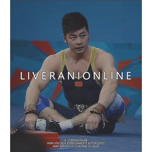 (120803) -- LONDON, Aug. 3, 2012 () -- Lu Yong of China reacts after a failed attempt during men\'s 85kg weightlifting event at London 2012 Olympic Games, London, Britain, Aug. 3, 2012. Lu Yong failed the three attempts of clean and jerk. (/Guo Yong) ©PHOTOSHOT/Agenzia Aldo Liverani Sas - ITALY ONLY - GIOCHI OLIMPICI, OLIMPIADI LONDRA 2012