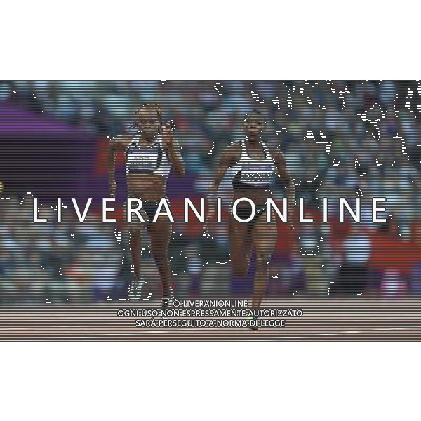 (120803) -- LONDON, Aug. 3, 2012 () -- Murielle Ahoure (R) of Cote d\'Ivoire and Laverne Jones-Ferrette of U.S. Virgin Islands compete during women\'s 100m round one contest at London 2012 Olympic Games in London, Britain, August 3, 2012. Murielle Ahoure of Cote d\'Ivoire and Laverne Jones-Ferrette of U.S. Virgin Islands were qualified for semifinal. (/Tao Xiyi) (zgp) ©PHOTOSHOT/Agenzia Aldo Liverani Sas - ITALY ONLY - GIOCHI OLIMPICI, OLIMPIADI LONDRA 2012