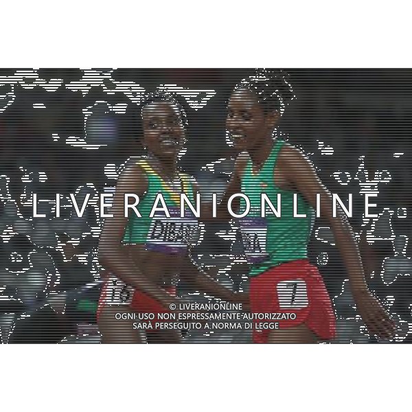 (120803) -- LONDON, Aug. 3, 2012 () -- Tirunesh Dibaba (L) of Ethiopia celebrates after women\'s 10,000m competition at London 2012 Olympic Games in London, Britain, August 3, 2012. Tirunesh Dibaba won gold medal with 30:20.75. (/Liao Yujie) (zgp) ©PHOTOSHOT/Agenzia Aldo Liverani Sas - ITALY ONLY - GIOCHI OLIMPICI, OLIMPIADI LONDRA 2012