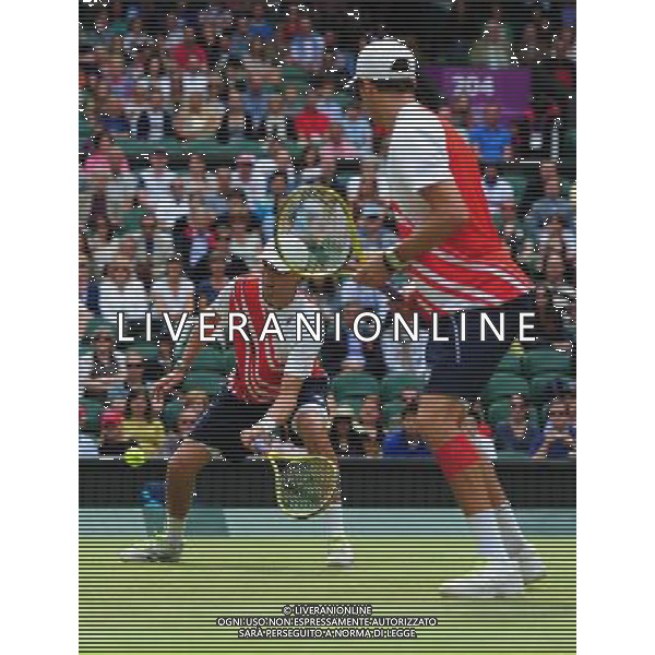 (120804) -- LONDON, Aug. 4, 2012 () -- Mike Bryan and Bob Bryan of USA compete during men\'s tennis doubles gold medal match against Michael Llodra and Jo-Wilfried Tsonga of France, at London 2012 Olympic Games in London, Britain, on August 4, 2012. (/Tao Xiyi) (nxl) ©PHOTOSHOT/Agenzia Aldo Liverani Sas - ITALY ONLY - GIOCHI OLIMPICI, OLIMPIADI LONDRA 2012