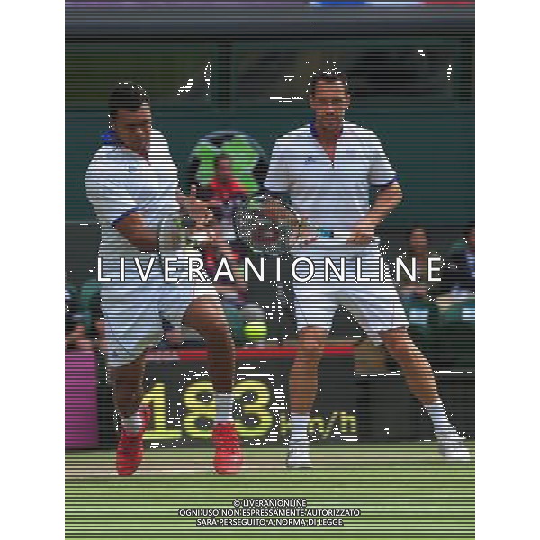(120804) -- LONDON, Aug. 4, 2012 () -- Michael Llodra and Jo-Wilfried Tsonga of France compete during men\'s tennis doubles gold medal match against Mike Bryan and Bob Bryan of USA, at London 2012 Olympic Games in London, Britain, on August 4, 2012. (/Tao Xiyi) (nxl) ©PHOTOSHOT/Agenzia Aldo Liverani Sas - ITALY ONLY - GIOCHI OLIMPICI, OLIMPIADI LONDRA 2012
