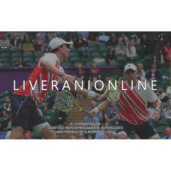 (120804) -- LONDON, Aug. 4, 2012 () -- Mike Bryan and Bob Bryan of USA compete during men\'s tennis doubles gold medal match against Michael Llodra and Jo-Wilfried Tsonga of France, at London 2012 Olympic Games in London, Britain, on August 4, 2012. (/Tao Xiyi) (nxl) ©PHOTOSHOT/Agenzia Aldo Liverani Sas - ITALY ONLY - GIOCHI OLIMPICI, OLIMPIADI LONDRA 2012