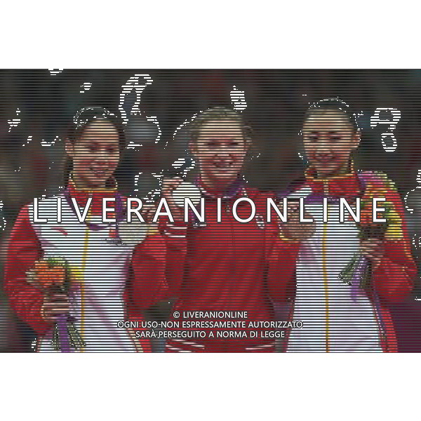 (120804) -- LONDON, Aug. 4, 2012 () -- Gold medalist Rosannagh Maclennan (C) of Canada, silver medalist Huang Shanshan (L) of China, bronze medalist He Wenna of China attend awarding ceremony of women\'s trampoline competition at the London 2012 Olympic Games in London, Britain, Aug. 4, 2012. (/Wang Shen)(zgp) ©PHOTOSHOT/Agenzia Aldo Liverani Sas - ITALY ONLY - GIOCHI OLIMPICI, OLIMPIADI LONDRA 2012