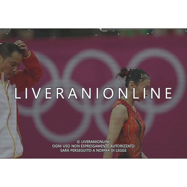 (120804) -- LONDON, Aug. 4, 2012 () -- China\'s He Wenna leaves after women\'s trampoline competition at the London 2012 Olympic Games in London, Britain, Aug. 4, 2012. He Wenna won bronze medal. (/Shen Bohan)(zgp) ©PHOTOSHOT/Agenzia Aldo Liverani Sas - ITALY ONLY - GIOCHI OLIMPICI, OLIMPIADI LONDRA 2012