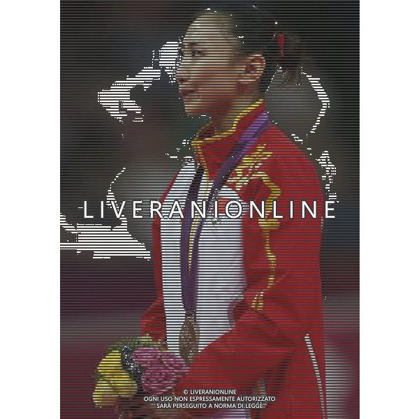 (120804) -- LONDON, Aug. 4, 2012 () -- Bronze medalist He Wenna of China attends awarding ceremony of women\'s trampoline competition at the London 2012 Olympic Games in London, Britain, Aug. 4, 2012. (/Shen Bohan)(zgp) ©PHOTOSHOT/Agenzia Aldo Liverani Sas - ITALY ONLY - GIOCHI OLIMPICI, OLIMPIADI LONDRA 2012