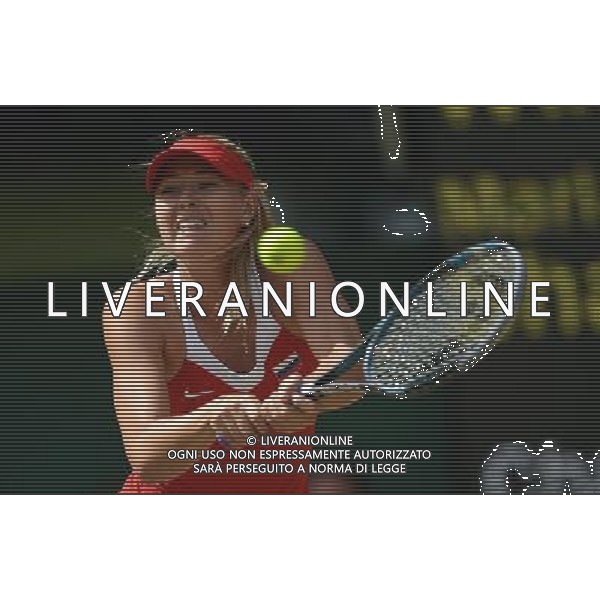 (120804) -- LONDON, Aug. 4, 2012 () -- Maria Sharapova of Russia takes part in women\'s tennis singles gold medal match, at London 2012 Olympic Games in London, Britain, on August 4, 2012. Serena Williams of USA defeated Maria Sharapova of Russia 2-0. (/Tao Xiyi) (nxl) ©PHOTOSHOT/Agenzia Aldo Liverani Sas - ITALY ONLY - GIOCHI OLIMPICI, OLIMPIADI LONDRA 2012