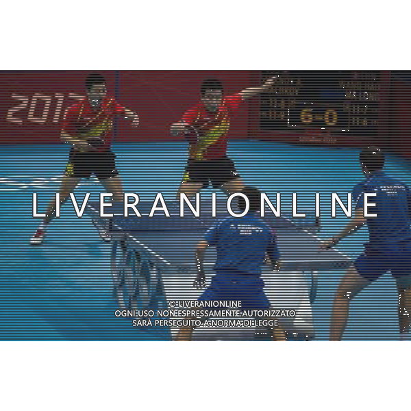 (120803) -- LONDON, Aug. 3, 2012 () -- China\'s Ma Long (1st L)/Wang Hao compete during men\'s team contest of table tennis between Russia and China, at London 2012 Olympic Games in London, Britain, on August 4, 2012. China won the match 3-1. (/Jin Liwang) (zgp) ©PHOTOSHOT/Agenzia Aldo Liverani Sas - ITALY ONLY - GIOCHI OLIMPICI, OLIMPIADI LONDRA 2012
