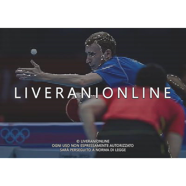 (120803) -- LONDON, Aug. 3, 2012 () -- Alexander Shibaev of Russia serves the ball during men\'s team contest of table tennis between Russia and China, at London 2012 Olympic Games in London, Britain, on August 4, 2012. China won the match 3-1. (/Jin Liwang) (zgp) ©PHOTOSHOT/Agenzia Aldo Liverani Sas - ITALY ONLY - GIOCHI OLIMPICI, OLIMPIADI LONDRA 2012