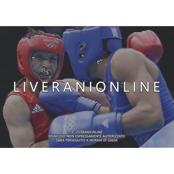 (120804) -- LONDON, Aug. 4, 2012 () -- China\'s Zou Shiming (L) competes with Yosbany Veitia Soto of Cuba during men\'s light fly of boxing competition at London 2012 Olympic Games in London, Britain, August 4, 2012. Zou Shiming won the match and advanced to quarterfinal. (/Wang Shen) (zgp) ©PHOTOSHOT/Agenzia Aldo Liverani Sas - ITALY ONLY - GIOCHI OLIMPICI, OLIMPIADI LONDRA 2012