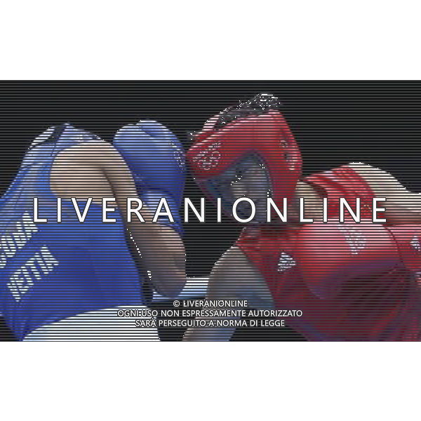 (120804) -- LONDON, Aug. 4, 2012 () -- China\'s Zou Shiming (R) competes with Yosbany Veitia Soto of Cuba during men\'s light fly of boxing competition at London 2012 Olympic Games in London, Britain, August 4, 2012. Zou Shiming won the match and advanced to quarterfinal. (/Wang Shen) (zgp) ©PHOTOSHOT/Agenzia Aldo Liverani Sas - ITALY ONLY - GIOCHI OLIMPICI, OLIMPIADI LONDRA 2012