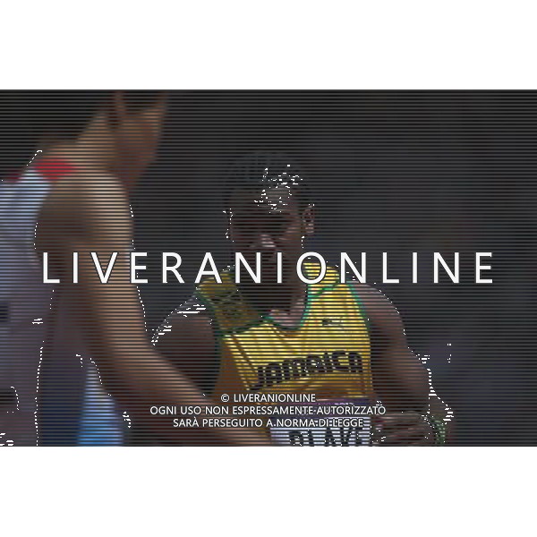 (120804) -- LONDON, Aug. 4, 2012 () -- Yohan Blake of Jamaica acts during the men\'s 100m round 1 heats at London 2012 Olympic Games, London, Britain, Aug. 4, 2012. Asafa Powell was qualified for the semifinal with a time of 10.04 seconds. Yohan Blake was qualified for the semifinal with a time of 10.00 (/Liao Yujie) ©PHOTOSHOT/Agenzia Aldo Liverani Sas - ITALY ONLY - GIOCHI OLIMPICI, OLIMPIADI LONDRA 2012