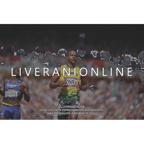 (120804) -- LONDON, Aug. 4, 2012 () -- Asafa Powell of Jamaica (R) competes during the men\'s 100m round 1 heats at London 2012 Olympic Games, London, Britain, Aug. 4, 2012. Asafa Powell was qualified for the semifinal with a time of 10.04 seconds. (/Liao Yujie) ©PHOTOSHOT/Agenzia Aldo Liverani Sas - ITALY ONLY - GIOCHI OLIMPICI, OLIMPIADI LONDRA 2012