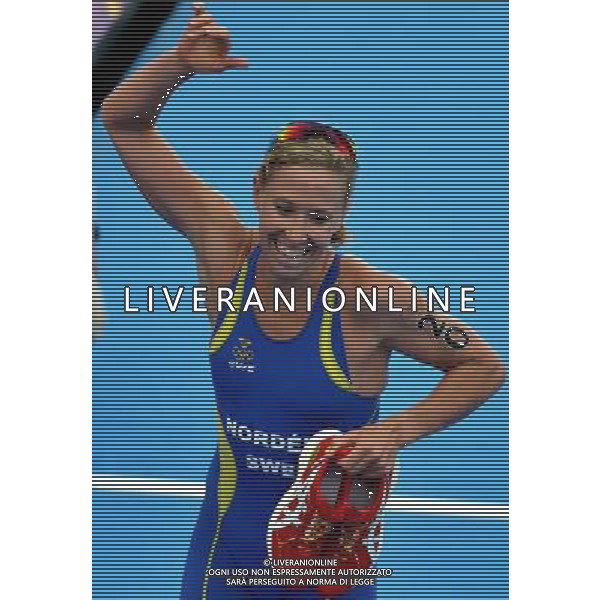 (120804) -- LONDON, Aug. 4, 2012 () -- Lisa Norden of Sweden celebrates after women\'s triathlon competition at London 2012 Olympic Games in London, Britain, August 4, 2012. Nicola Spirig of Switzerland won gold medal with 1:59.48. Lisa Norden of Sweden won silver medal. Erin Densham of Australia won bronze medal. (/Gesang Dawa) (zgp) ©PHOTOSHOT/Agenzia Aldo Liverani Sas - ITALY ONLY - GIOCHI OLIMPICI, OLIMPIADI LONDRA 2012