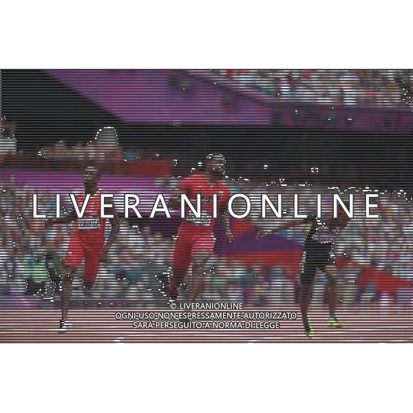 (120804) -- LONDON, Aug. 4, 2012 () -- (L to R) Rondel Sorrillo of Trinidad and Tobago, Justin Gatlin of the United States and Barakat Mubarak al-Harthi of Oman compete during the men\'s 100m round 1 heats at London 2012 Olympic Games, London, Britain, Aug. 4, 2012. (/Liao Yujie) ©PHOTOSHOT/Agenzia Aldo Liverani Sas - ITALY ONLY - GIOCHI OLIMPICI, OLIMPIADI LONDRA 2012