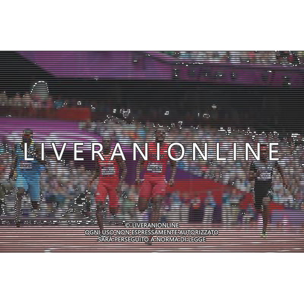 (120804) -- LONDON, Aug. 4, 2012 () -- (L to R) Derrick Atkins of Bahamas, Rondel Sorrillo of Trinidad and Tobago, Justin Gatlin of the United States and Barakat Mubarak al-Harthi of Oman compete during the men\'s 100m round 1 heats at London 2012 Olympic Games, London, Britain, Aug. 4, 2012. (/Liao Yujie) ©PHOTOSHOT/Agenzia Aldo Liverani Sas - ITALY ONLY - GIOCHI OLIMPICI, OLIMPIADI LONDRA 2012