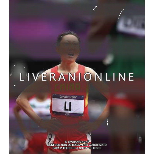 (120804) -- LONDON, Aug. 4, 2012 () -- Li Zhenzhu of China acts after finishing the women\'s 3000m steeplechase heats at London 2012 Olympic Games, London, Britain, Aug. 4, 2012. (/Liao Yujie) ©PHOTOSHOT/Agenzia Aldo Liverani Sas - ITALY ONLY - GIOCHI OLIMPICI, OLIMPIADI LONDRA 2012
