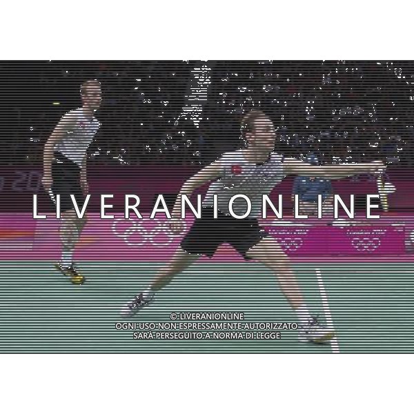 (120804) -- LONDON, Aug. 4, 2012 () -- Mathias Boe/Carsten Mogensen of Denmark compete during men\'s doubles semifinal of badminton against Chung Jae Sung/Lee Yong Dae of South Korea, at London 2012 Olympic Games in London, Britain, August 4, 2012. Mathias Boe/Carsten Mogensen won the match 2-1. (/Tang Shi) (zgp) ©PHOTOSHOT/Agenzia Aldo Liverani Sas - ITALY ONLY - GIOCHI OLIMPICI, OLIMPIADI LONDRA 2012